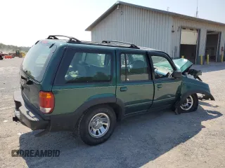 2001 Ford Explorer XLS with VIN 1FMZU72E41ZA71028, listed as a Copart auction lot 59396175 with 200,898 mi miles and Salvage title. Bid and sale history available at DreamBid. Image 3.