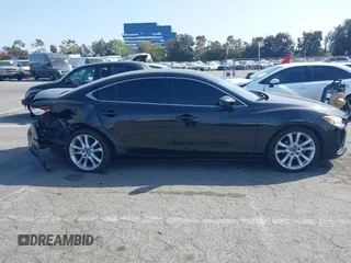 2016 Mazda 6 i Touring with VIN JM1GJ1V57G1444843, listed as a IAAI auction lot 41920436 with 154,863 mi miles and . Bid and sale history available at DreamBid. Image 13.
