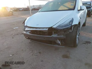 2023 Tesla Model Y Long Range z VIN 7SAYGDEE6PA061228, wystawiony jako IAAI lot #41371547 z przebiegiem 25 121 mil mil oraz . Historia ofert i sprzedaży dostępna na DreamBid. Obrazek 6.