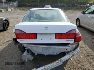 2000 Honda Accord LX z VIN 1HGCG1642YA080255, wystawiony jako Copart lot #53636855 z przebiegiem 146 478 mil mil oraz Szkoda całkowita • Salvage title. Historia ofert i sprzedaży dostępna na DreamBid. Obrazek 6.