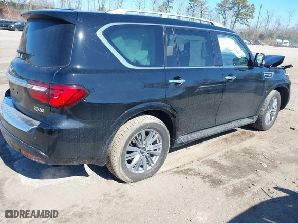 2023 Infiniti QX80 LUXE with VIN JN8AZ2AE3P9303090, listed as a IAAI auction lot 41659443 with 27,699 mi miles. Bid and sale history available at carsss.com. Image 4.
