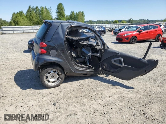 2009 Smart fortwo Pure z VIN WMEEJ31X09K267836, wystawiony jako Copart lot #55500135 z przebiegiem Nie podano mil oraz Szkoda całkowita • Salvage title. Historia ofert i sprzedaży dostępna na DreamBid. Obrazek 3.