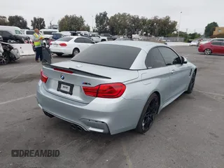 2018 BMW M4 with VIN WBS4Z9C50JED22690, listed as a IAAI auction lot 42439194 with 61,928 mi miles and . Bid and sale history available at DreamBid. Image 4.