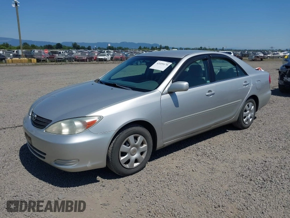 2004 Toyota Camry LE with VIN 4T1BE32K74U365621, listed as a IAAI auction lot 42459170 with 236,485 mi miles and . Bid and sale history available at DreamBid. Image 2.