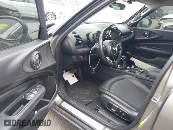 2016 MINI Clubman z VIN WMWLN5C56G2E30309, wystawiony jako IAAI lot #41772501 z przebiegiem 67 584 mil mil oraz . Historia ofert i sprzedaży dostępna na DreamBid. Obrazek 13.