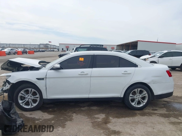 2015 Ford Taurus SEL with VIN 1FAHP2E88FG207444, listed as a IAAI auction lot 41728158 with Not Provided miles and . Bid and sale history available at carsss.com. Image 13.