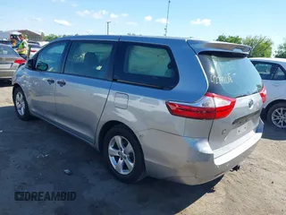 2015 Toyota Sienna L with VIN 5TDZK3DCXFS594786, listed as a IAAI auction lot 42292618 with 180,119 mi miles and . Bid and sale history available at DreamBid. Image 3.