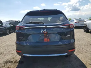 2017 Mazda CX-9 Grand Touring z VIN JM3TCBDY8H0131941, wystawiony jako Copart lot #56199685 z przebiegiem 166 080 mil mil oraz Szkoda całkowita • Salvage title. Historia ofert i sprzedaży dostępna na DreamBid. Obrazek 6.