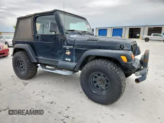 2000 Jeep Wrangler Sahara with VIN 1J4FA59S1YP777549, listed as a Copart auction lot 63622335 with 197,426 mi miles and Clean title. Bid and sale history available at DreamBid. Image 4.