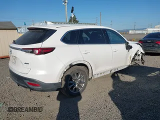 2018 Mazda CX-9 Touring z VIN JM3TCBCY3J0223076, wystawiony jako IAAI lot #42099819 z przebiegiem 160 097 mil mil oraz . Historia ofert i sprzedaży dostępna na DreamBid. Obrazek 4.