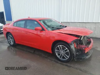 2019 Dodge Charger SXT with VIN 2C3CDXJGXKH611601, listed as a Copart auction lot 71523354 with 133,178 mi miles and Clean Title. Bid and sale history available at DreamBid. Image 4.