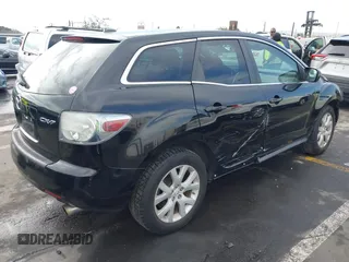 2009 Mazda CX-7 Grand Touring with VIN JM3ER29L990234727, listed as a IAAI auction lot 41272921 with 173,753 mi miles. Bid and sale history available at carsss.com. Image 4.