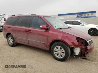 2012 Kia Sedona LX with VIN KNDMG4C77C6501093, listed as a Copart auction lot 48918985 with 194,364 mi miles and Salvage Title. Bid and sale history available at carsss.com. Image 4.