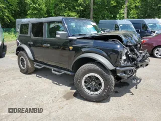 2022 Ford Bronco with VIN 1FMEE5DP6NLB29910, listed as a Copart auction lot 63012245 with 50,354 mi miles and Salvage title. Bid and sale history available at DreamBid. Image 4.