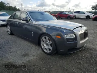 2012 Rolls-Royce Ghost z VIN SCA664S59CUX50672, wystawiony jako Copart lot #73685494 z przebiegiem Nie podano mil oraz Szkody całkowita. Historia ofert i sprzedaży dostępna na DreamBid. Obrazek 4.
