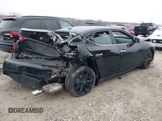 2018 Nissan Maxima SV with VIN 1N4AA6AP5JC387845, listed as a IAAI auction lot 41574505 with 50,629 mi miles and . Bid and sale history available at DreamBid. Image 4.
