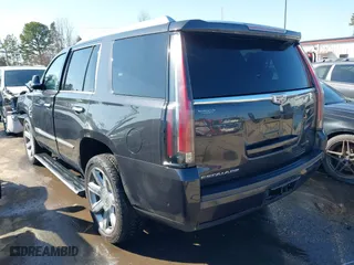 2019 Cadillac Escalade Premium Luxury with VIN 1GYS4CKJ1KR407662, listed as a IAAI auction lot 41519495 with 101,892 mi miles. Bid and sale history available at carsss.com. Image 3.