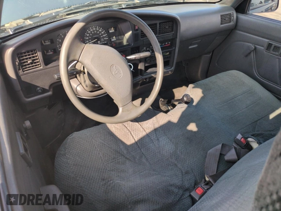 1994 Toyota Pickup DX with VIN JT4RN81PXR5174113, listed as a Copart auction lot 64211905 with 209,694 mi miles and Salvage title. Bid and sale history available at DreamBid. Image 8.