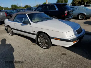 1990 Chrysler LeBaron z VIN 1C3XJ4533LG472070, wystawiony jako Copart lot #74314104 z przebiegiem 97 354 mil mil oraz Szkody całkowita. Historia ofert i sprzedaży dostępna na DreamBid. Obrazek 4.