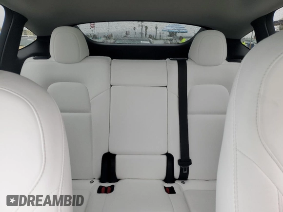 2023 Tesla Model Y Performance with VIN 7SAYGDEF1PF809654, listed as a Copart auction lot 43981915 with 16,401 mi miles and Salvage Title. Bid and sale history available at DreamBid. Image 10.