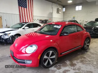 2012 Volkswagen Beetle 2.0T Black Turbo Launch Edition PZEV with VIN 3VWVA7AT8CM607203, listed as a Copart auction lot 47852705 with 119,477 mi miles and Clean Title. Bid and sale history available at carsss.com. Image 1.