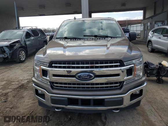2018 Ford F-150 XL with VIN 1FTEW1EG1JKD01897, listed as a Copart auction lot 52923115 with 219,341 mi miles and Clean Title. Bid and sale history available at carsss.com. Image 5.