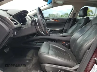 2013 Lincoln MKZ z VIN 3LN6L2G91DR822051, wystawiony jako Copart lot #64748755 z przebiegiem 187 444 mil mil oraz Szkoda całkowita • Salvage title. Historia ofert i sprzedaży dostępna na DreamBid. Obrazek 7.