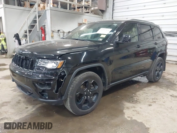 2021 Jeep Grand Cherokee Laredo X with VIN 1C4RJFAG5MC817567, listed as a IAAI auction lot 42297526 with 71,387 mi miles and . Bid and sale history available at DreamBid. Image 2.