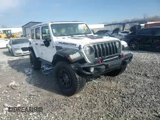 2021 Jeep Wrangler Unlimited Rubicon with VIN 1C4JJXFG1MW849460, listed as a Copart auction lot 45307515 with 54,517 mi miles and Salvage title. Bid and sale history available at DreamBid. Image 14.