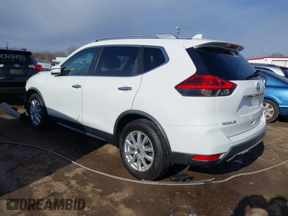 2017 Nissan Rogue SV with VIN KNMAT2MT7HP601954, listed as a IAAI auction lot 41865794 with 136,280 mi miles. Bid and sale history available at carsss.com. Image 3.