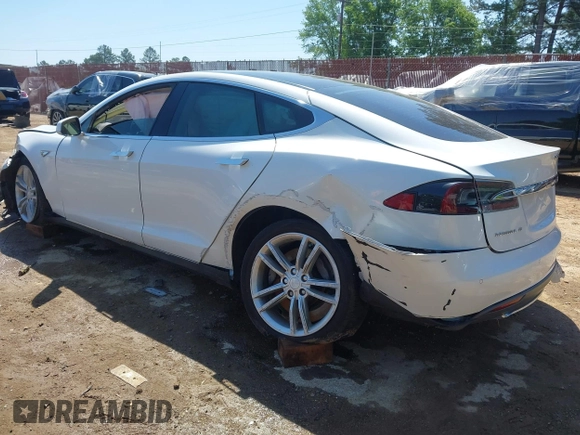 2013 Tesla Model S z VIN 5YJSA1CN6DFP21076, wystawiony jako IAAI lot #41984834 z przebiegiem 154 662 mil mil oraz . Historia ofert i sprzedaży dostępna na DreamBid. Obrazek 3.