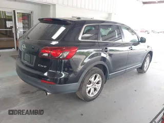 2014 Mazda CX-9 Touring with VIN JM3TB2CA2E0446267, listed as a IAAI auction lot 42196512 with 98,670 mi miles and . Bid and sale history available at carsss.com. Image 4.