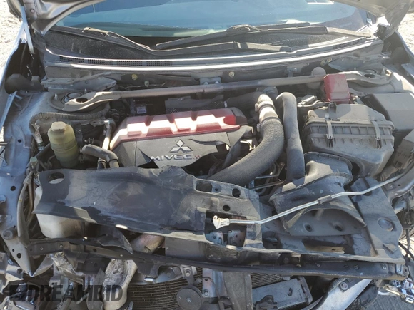 2015 Mitsubishi Lancer Evolution Final Edition z VIN JA32W7FV0FU027962, wystawiony jako Copart lot #85763774 z przebiegiem 56 671 mil mil oraz Szkoda całkowita • Salvage title. Historia ofert i sprzedaży dostępna na DreamBid. Obrazek 12.