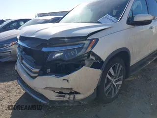 2016 Honda Pilot Elite with VIN 5FNYF6H05GB019292, listed as a IAAI auction lot 41668830 with 170,718 mi miles. Bid and sale history available at carsss.com. Image 6.