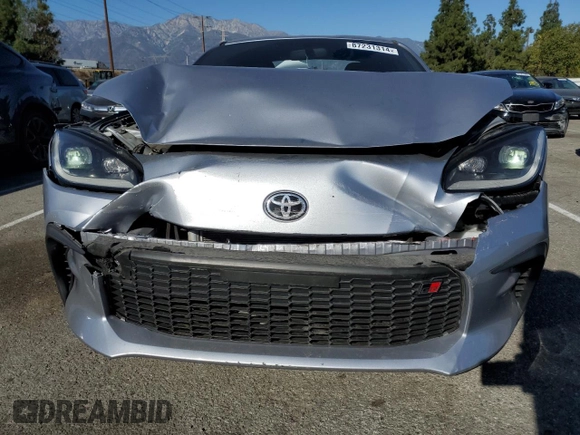 2022 Toyota GR86 Premium with VIN JF1ZNBE12N9753110, listed as a Copart auction lot 87231314 with 27,069 mi miles and Salvage Title. Bid and sale history available at carsss.com. Image 5.