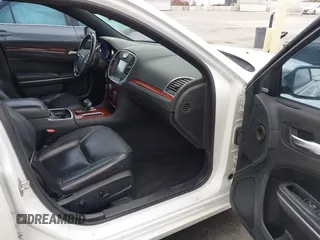 2012 Chrysler 300 Limited with VIN 2C3CCACG2CH237841, listed as a IAAI auction lot 42134640 with 140,554 mi miles. Bid and sale history available at carsss.com. Image 5.