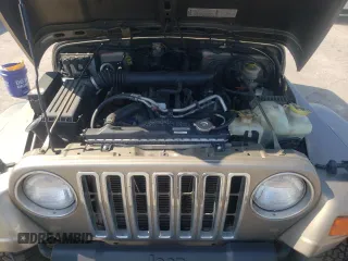 2003 Jeep Wrangler Sahara with VIN 1J4FA59S23P303845, listed as a Copart auction lot 68101244 with 141,753 mi miles and Clean Title. Bid and sale history available at carsss.com. Image 11.