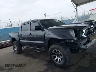 2015 Toyota Tacoma with VIN 3TMLU4EN8FM167337, listed as a IAAI auction lot 42117662 with 60,929 mi miles. Bid and sale history available at carsss.com. Image 13.