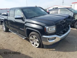2017 GMC Sierra 1500 SLE z VIN 1GTV2MEC1HZ140821, wystawiony jako IAAI lot #41838298 z przebiegiem 98 229 mil mil oraz . Historia ofert i sprzedaży dostępna na DreamBid. Obrazek 1.