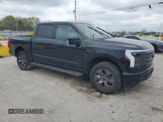 2023 Ford F-150 Lightning Pro z VIN 1FTVW1EV4PWG12935, wystawiony jako Copart lot #52685485 z przebiegiem Nie podano mil oraz Szkody całkowita. Historia ofert i sprzedaży dostępna na DreamBid. Obrazek 4.