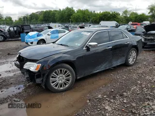 2012 Chrysler 300 C z VIN 2C3CCAKT0CH143424, wystawiony jako Copart lot #60441245 z przebiegiem 172 579 mil mil oraz Szkoda całkowita • Salvage title. Historia ofert i sprzedaży dostępna na DreamBid. Obrazek 1.