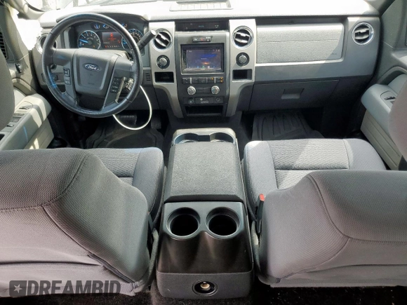 2012 Ford F-150 XL with VIN 1FTFW1ETXCFB32623, listed as a Copart auction lot 54597435 with 210,722 mi miles and Salvage Title. Bid and sale history available at DreamBid. Image 8.