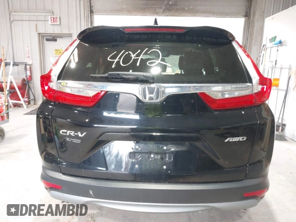 2017 Honda CR-V EX with VIN 2HKRW2H5XHH683308, listed as a IAAI auction lot 42084042 with 82,101 mi miles. Bid and sale history available at carsss.com. Image 16.