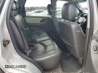 2004 Mazda Tribute ES with VIN 4F2CZ96104KM18818, listed as a Copart auction lot 68863884 with 317,983 mi miles and Salvage Title. Bid and sale history available at carsss.com. Image 10.
