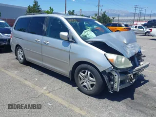 2007 Honda Odyssey EX-L z VIN 5FNRL38657B442342, wystawiony jako IAAI lot #42214007 z przebiegiem 128 276 mil mil oraz . Historia ofert i sprzedaży dostępna na DreamBid. Obrazek 1.