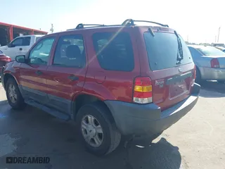 2003 Ford Escape XLT Popular with VIN 1FMYU03143KB33988, listed as a IAAI auction lot 41524123 with 1 mi miles. Bid and sale history available at carsss.com. Image 3.