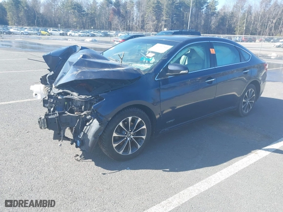 2016 Toyota Avalon Hybrid XLE Premium with VIN 4T1BD1EB2GU052127, listed as a IAAI auction lot 41737260 with 266,841 mi miles. Bid and sale history available at carsss.com. Image 18.
