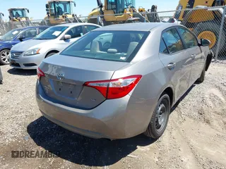 2015 Toyota Corolla L with VIN 5YFBURHE1FP312604, listed as a IAAI auction lot 42085424 with 123,379 mi miles and . Bid and sale history available at DreamBid. Image 4.