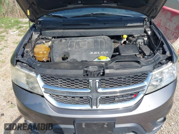 2012 Dodge Journey SXT with VIN 3C4PDCBG3CT310679, listed as a IAAI auction lot 42731771 with 165,928 mi miles and . Bid and sale history available at DreamBid. Image 10.