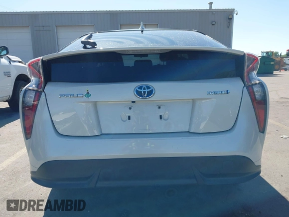 2017 Toyota Prius Two with VIN JTDKARFUXH3536565, listed as a IAAI auction lot 42374515 with 125,240 mi miles and . Bid and sale history available at DreamBid. Image 16.